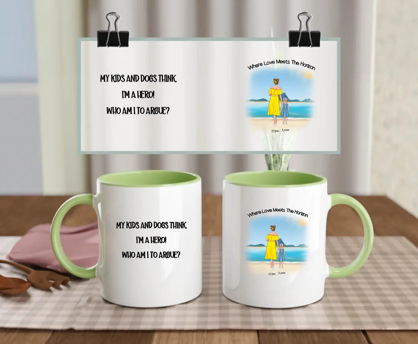 Green-handled ceramic mug with beach illustration of mum, kid, and optional pets – features the quote “My kids and dogs think I’m a hero” – custom gift for proud dog mums