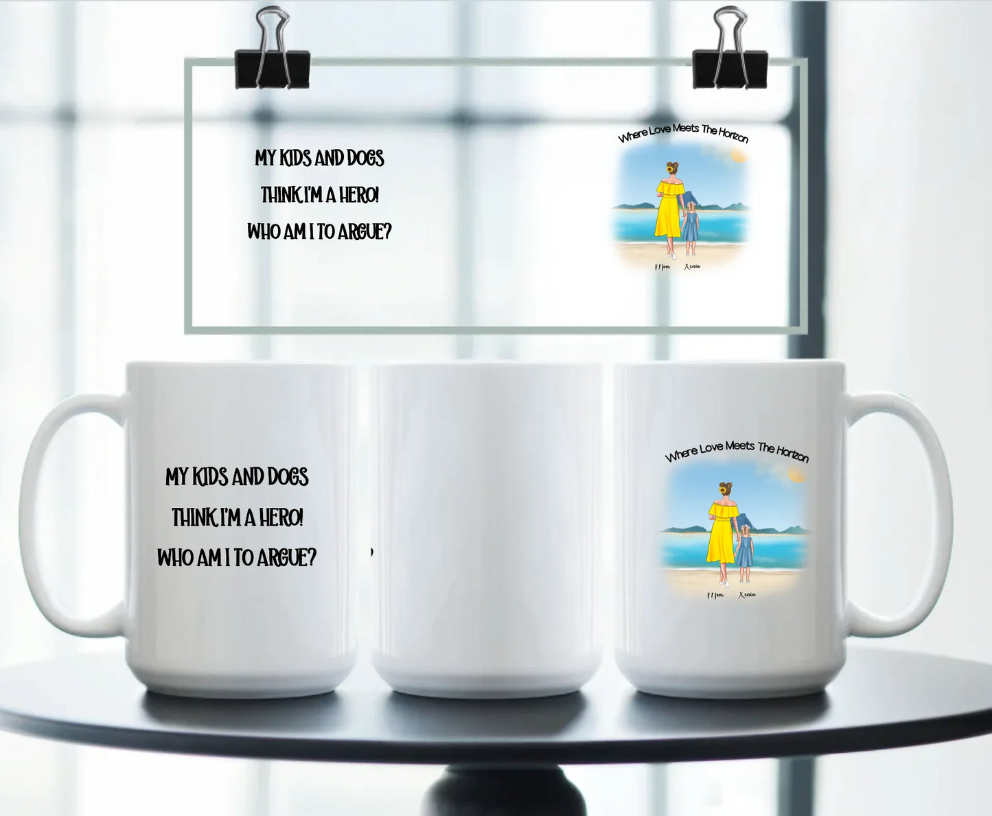 Large personalised white mug with illustrated beach scene of mother, child, and optional pets, plus quote “My kids and dogs think I’m a hero” – touching and funny gift for proud mums