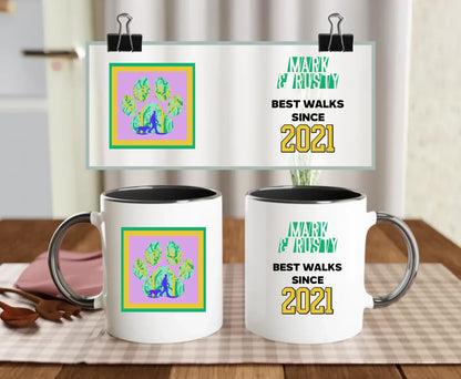 Personalised black-handled ceramic mug with retro paw print design, custom names, and “Best walks since 2021” quote – fun mug for dog dads or dog mums