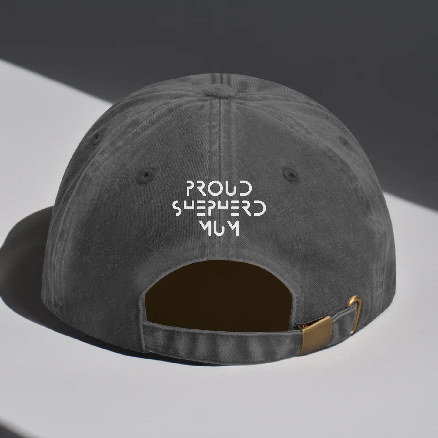 Grey vintage-style personalised baseball cap with white embroidery. Custom text can be added – perfect for proud dog mums or dads, and a thoughtful gift for pet lovers.