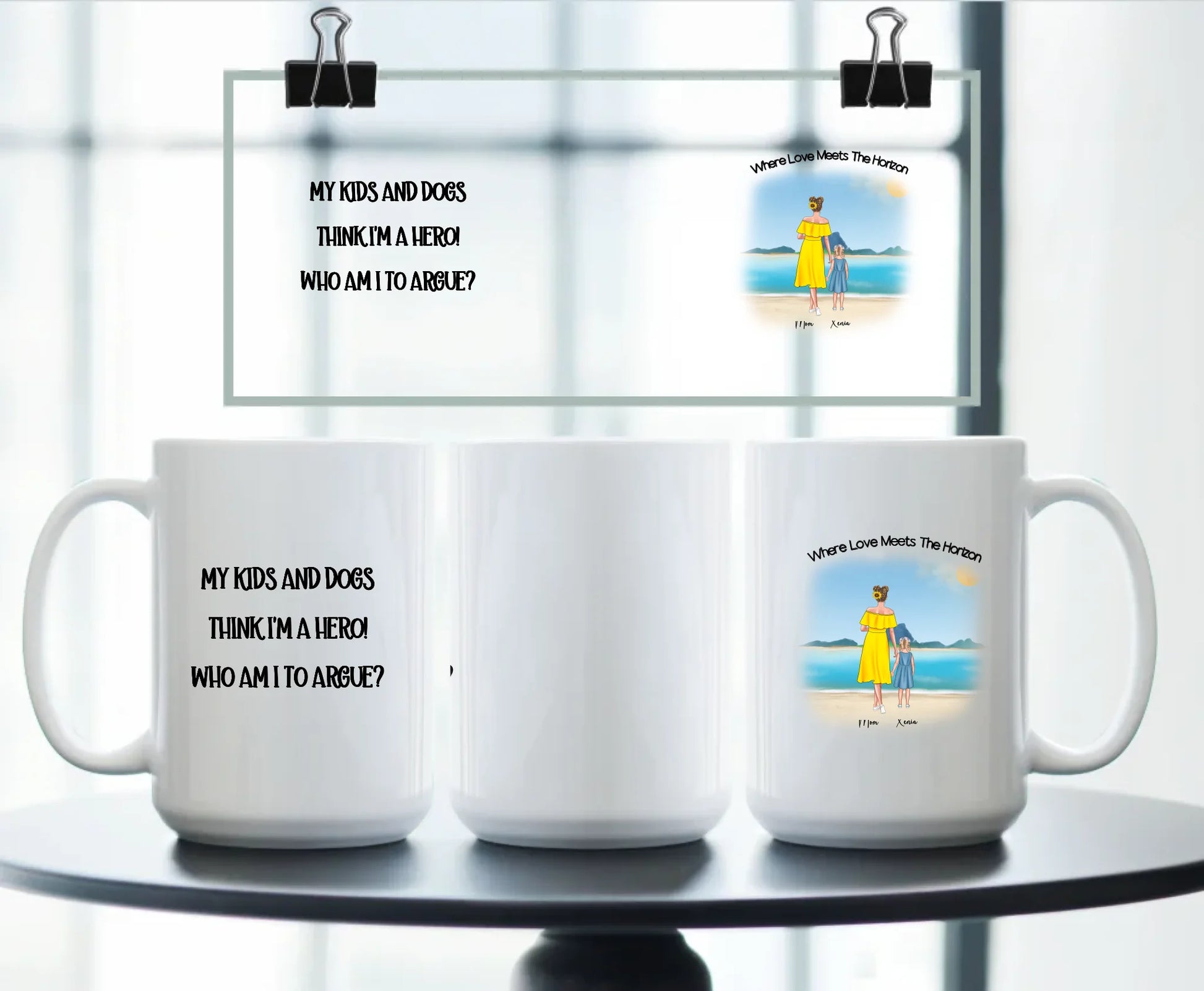 Large personalised white mug with illustrated beach scene of mother, child, and optional pets, plus quote “My kids and dogs think I’m a hero” – touching and funny gift for proud mums