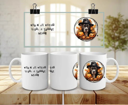 Personalised white Halloween mug with your chosen dog breed in AI-generated witch hat illustration, pumpkins, and spooky quote – “Trick or treat with a pittie beat” – perfect dog lover gift